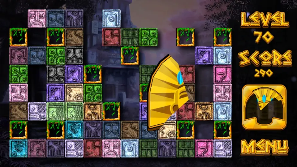 Nível 70 de Mayan Secret com blocos coloridos e uma máscara dourada sobre o tabuleiro